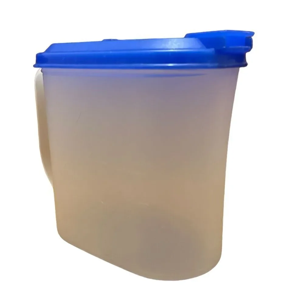 Tupperware 1 Quart semi sheer pitcher with blue flip top pouring lid 2189A-2.